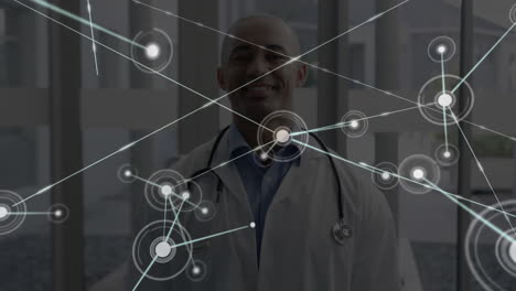 Animation-of-connections-over-african-american-male-doctor
