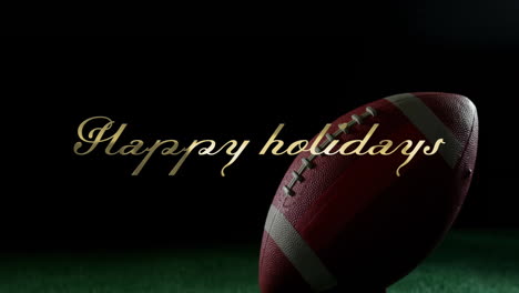Animation-of-happy-holidays-text-over-rugby-ball-placed-on-stand-in-ground