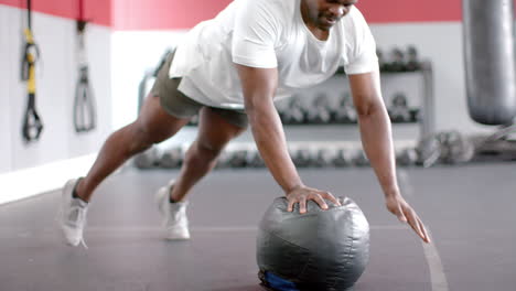 Fit-African-American-man-exercising-at-the-gym