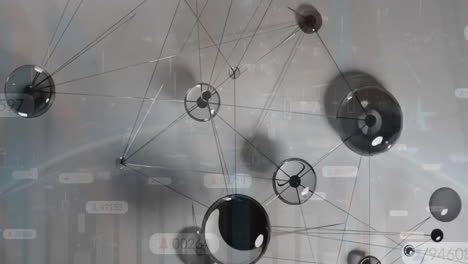 Animation-of-network-of-connections-and-data-processing-over-grey-background