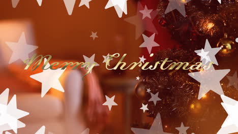 Animation-Von-Frohe-Weihnachten-Text-Und-Sternen-über-Weihnachtsbaum