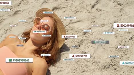 Animation-of-social-media-notifications-over-caucasian-woman-sunbathing-on-beach