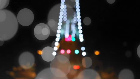 Animation-of-spots-of-light-over-christmas-city-lights