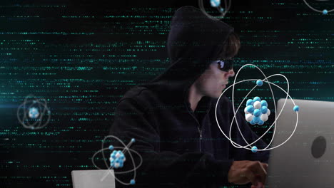 Animation-of-atom-structures-over-biracial-male-hacker-using-laptop-to-hack-system