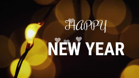 Animation-of-happy-new-year-text-over-yellow-bokeh-lights-on-black-background