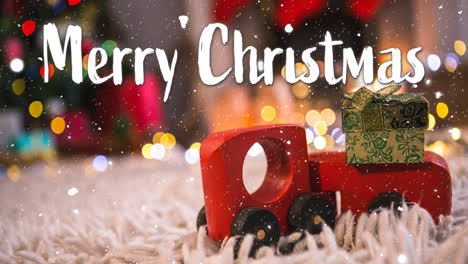 Animation-of-merry-christmas-text-over-snow-falling-with-christmas-decorations