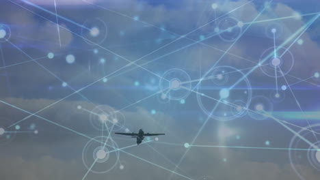 Animation-of-connected-dots-over-low-angle-view-of-airplane-flying-in-sky