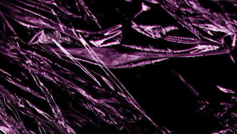 Animation-of-moving-and-changing-purple-texture-and-copy-space-on-black-background