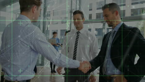 Animation-of-network-of-connections-over-diverse-colleagues-shaking-hands-in-office
