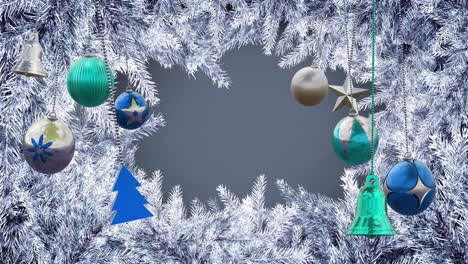 Animation-of-hanging-bauble,-tree,-bells-with-snow-covered-pine-leaves-against-gray-background