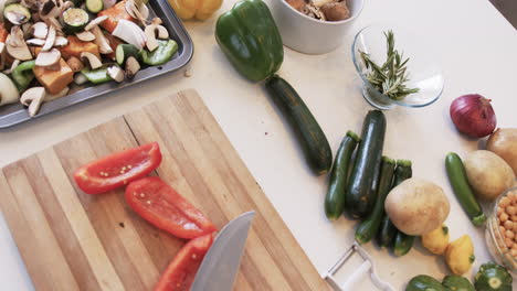 Fresh-vegetables-are-ready-for-chopping-on-a-kitchen-counter