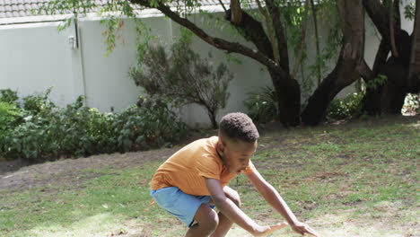 African-American-boy-plays-outdoors