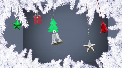 Animation-of-hanging-bells,-gift-box-and-bells-over-snow-covered-pine-leave-against-gray-background