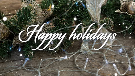 Animation-of-happy-holidays-text-over-snow-falling-with-christmas-decorations