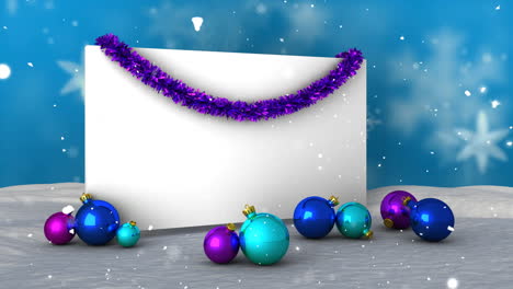 Animation-of-white-card-with-copy-space-and-snow-falling-with-christmas-baubles