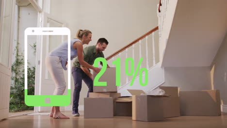 Animation-of-green-smartphone-and-percent-over-caucasian-couple-with-boxes-moving-in-to-new-home