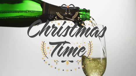 Animation-of-merry-christmas-text-over-champagne-pouring-into-glass