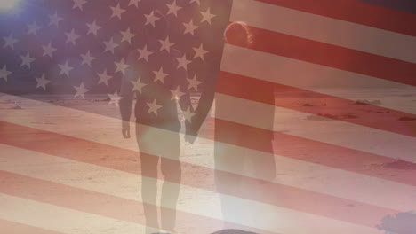 Animation-of-flag-of-usa-over-caucasian-couple-holding-hands-and-walking