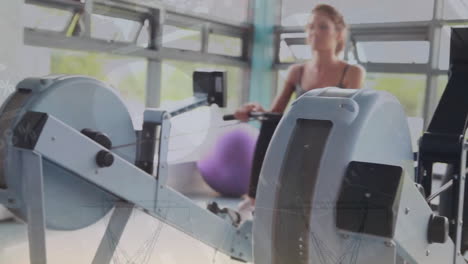 Animation-of-financial-data-processing-over-caucasian-women-exercising-on-gym