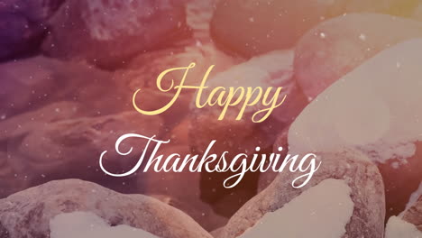 Animation-of-snowfall,-lens-flares-and-happy-thanksgiving-text-over-walnuts
