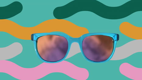 Animation-of-sunglasses-and-rows-of-waving-lines-over-abstract-vibrant-pattern