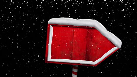 Animation-Von-Schnee,-Der-Zu-Weihnachten-über-Ein-Schild-Mit-Kopierraum-Auf-Schwarzem-Hintergrund-Fällt