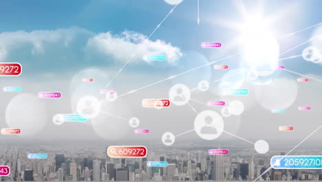 Animation-of-network-of-people-icons-and-media-notifications-over-cityscape-and-blue-sky