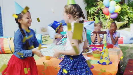 Animation-of-confetti-over-happy-diverse-girls-playing-with-present-at-birthday-party