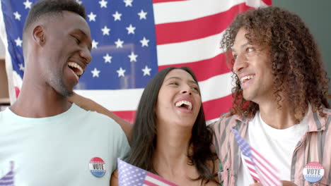 Diverse-friends-wearing-vote-badges-with-American-flags
