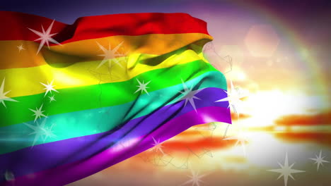 Animation-of-stars-and-rainbow-flag-against-cloudy-sky