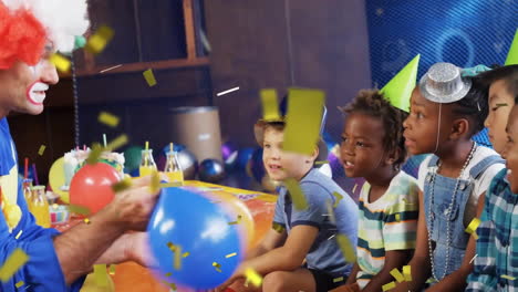 Animation-of-confetti-over-happy-diverse-children-and-male-clown-entertaining-them-at-party