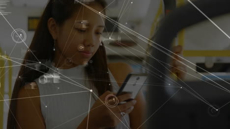 Animation-of-network-of-connections-asian-businesswoman-with-smartphone-in-office