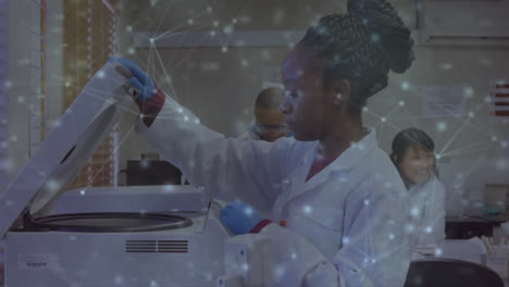 Animation-of-network-of-connections-over-african-american-female-scientist-taking-sample-in-lab