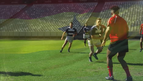 Animation-of-flag-of-ghana-over-diverse-male-rugby-players-playing-at-stadium