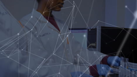 Animation-of-network-of-connections-over-african-american-female-scientist-taking-sample-in-lab