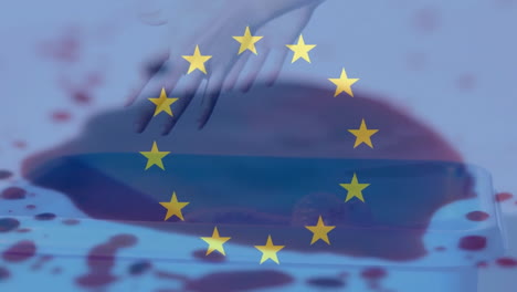 Animation-Der-EU-Flagge-Und-Hände-über-Flecken