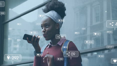 Animation-of-media-notifications-over-african-american-woman-talking-on-smartphone-in-city