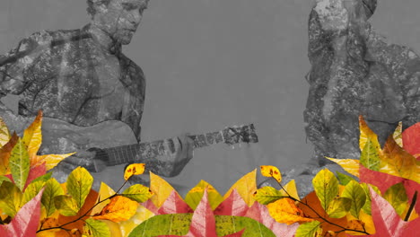 Animation-Von-Herbstblättern-über-Einem-Kaukasischen-Mann-Und-Einer-Kaukasischen-Frau,-Die-Gitarre-Und-Schlagzeug-Auf-Grau-Spielen