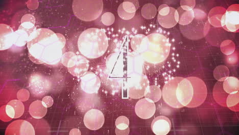 Animation-of-countdown-over-fireworks-and-glowing-spots-of-light-background
