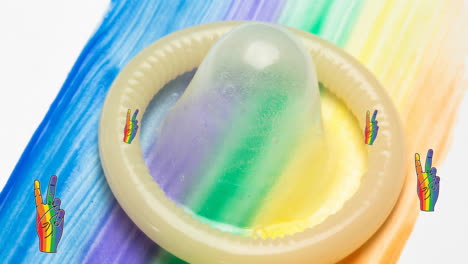 Animation-Von-Regenbogenhänden-Und-Pride-Texten-über-Kondom-Auf-Regenbogenhintergrund