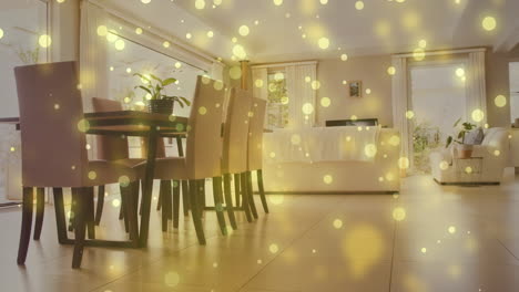 Animation-of-spots-of-light-over-modern-kitchen-and-dining-room