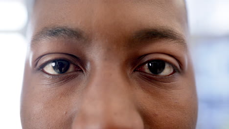 Portrait-of-happy-eyes-of-african-american-man-in-hospital,-slow-motion