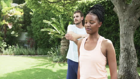 Young-African-American-woman-and-young-Caucasian-man-enjoying-outdoor-activities