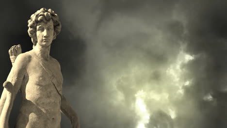Animation-of-gray-sculpture-of-man-over-dark-sky-and-clouds,-copy-space