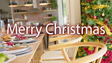 Animation-of-merry-christmas-text-over-table-set-for-christmas-dinner-at-home
