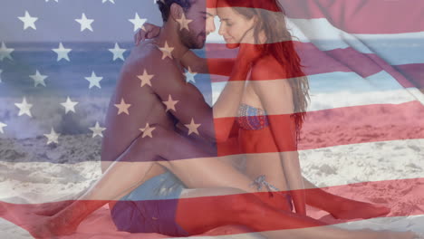 Animation-of-flag-of-usa-over-caucasian-couple-in-love-on-beach-in-summer