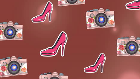 Animation-of-pink-high-heels-and-cameras-over-light-spots-on-brown-background