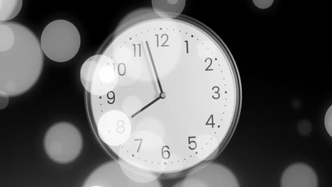 Animation-of-clock-ticking-over-spots-of-light-on-black-background