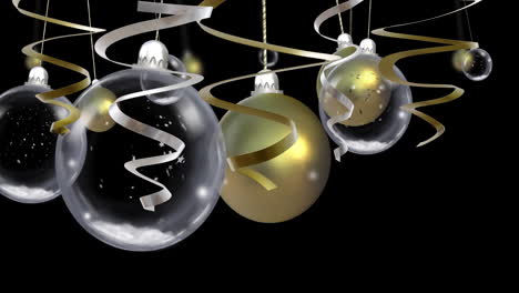 Animation-of-party-streamers-and-baubles-on-black-background