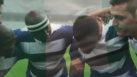 Animation-of-flag-of-nigeria-over-diverse-male-rugby-players-teaming-up-at-stadium